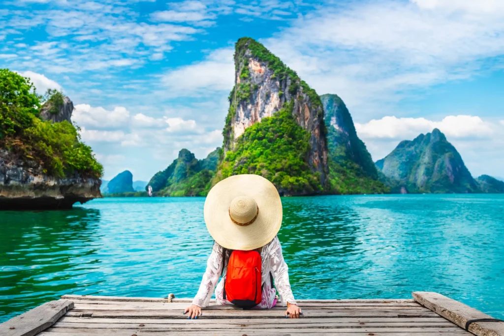 traveler woman looking amazed nature scenic landscape tropical island phangnga bay adventure lifestyle tourist travel phuket thailand summer Horizontal